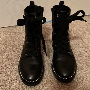 Antonio Milani leather booties. They zip and have cute tie laces, worn twice.